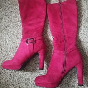 Knee high boots with heels.